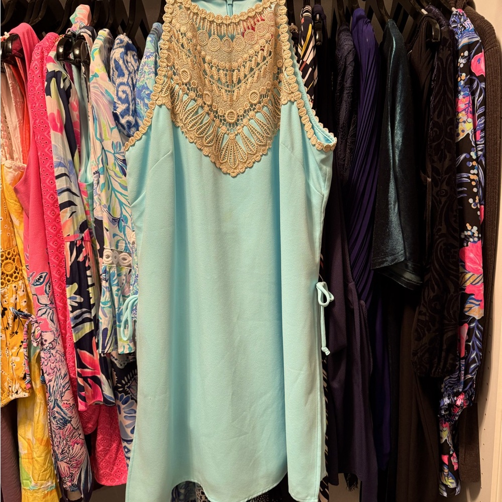 Light teal romper size 14